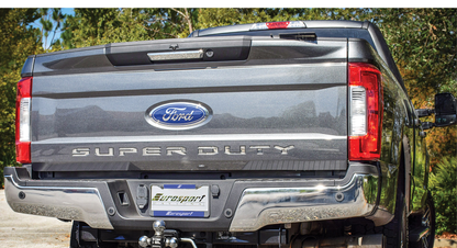 the rear end of a truck with a super duty license plate